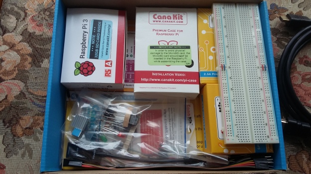 Box containing a Raspberry Pi 3 B+ and breadboard for electronics experiments
